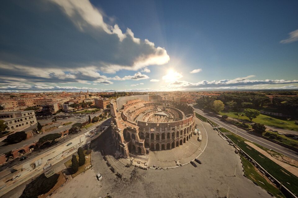 FPV drone over the Colosseum in Rome at sunset